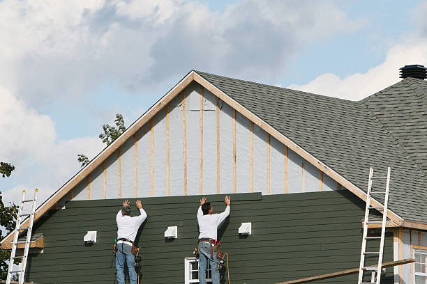 Professional Storm Damage Siding Repair technician working in Wesley Chapel, NC